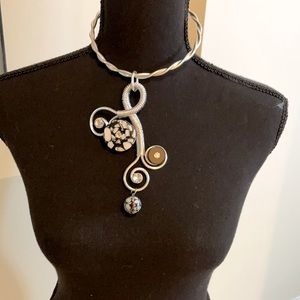 Silver necklace with black and white pendant